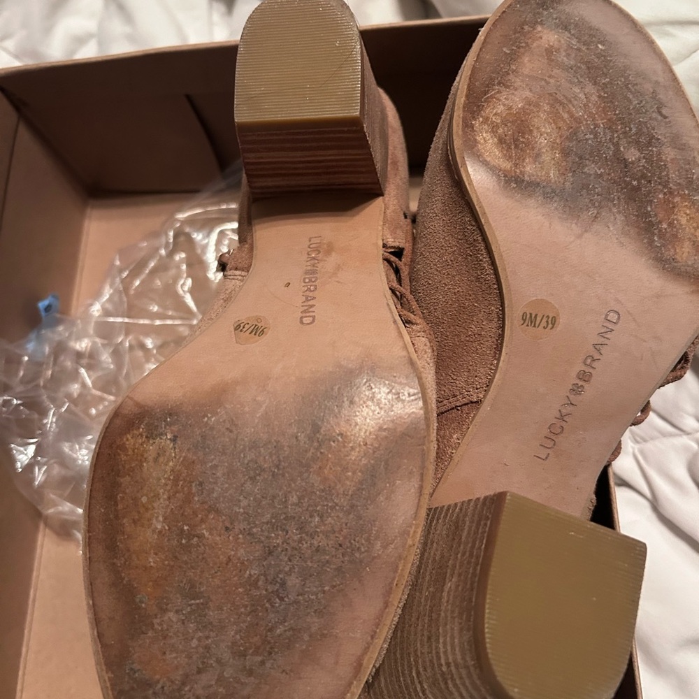 Lucky boots worn but no tears heels good condition